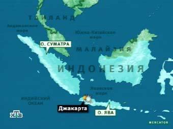 Область, пострадавшая в результате цунами. Кадр телеканала НТВ, архив